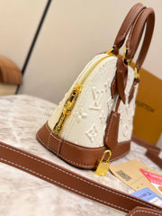 Louis Vuitton Alma BB in Embossed Monogram Denim