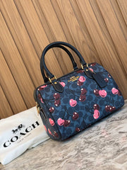 Coach Rowan Satchel in Signature Canvas with a cherry print