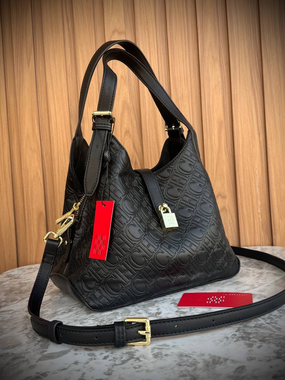 Carolina Herrera Monogram Embossed Leather Hobo Bag