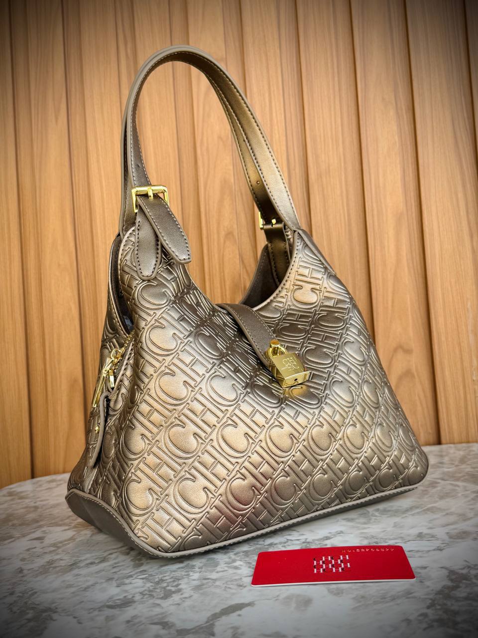 Carolina Herrera Monogram Embossed Leather Hobo Bag