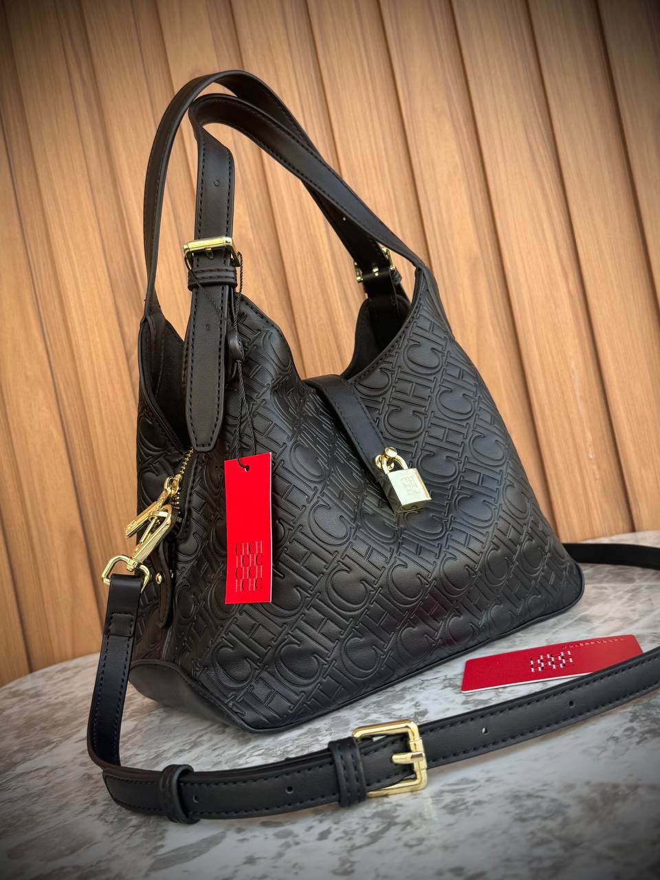 Carolina Herrera Monogram Embossed Leather Hobo Bag