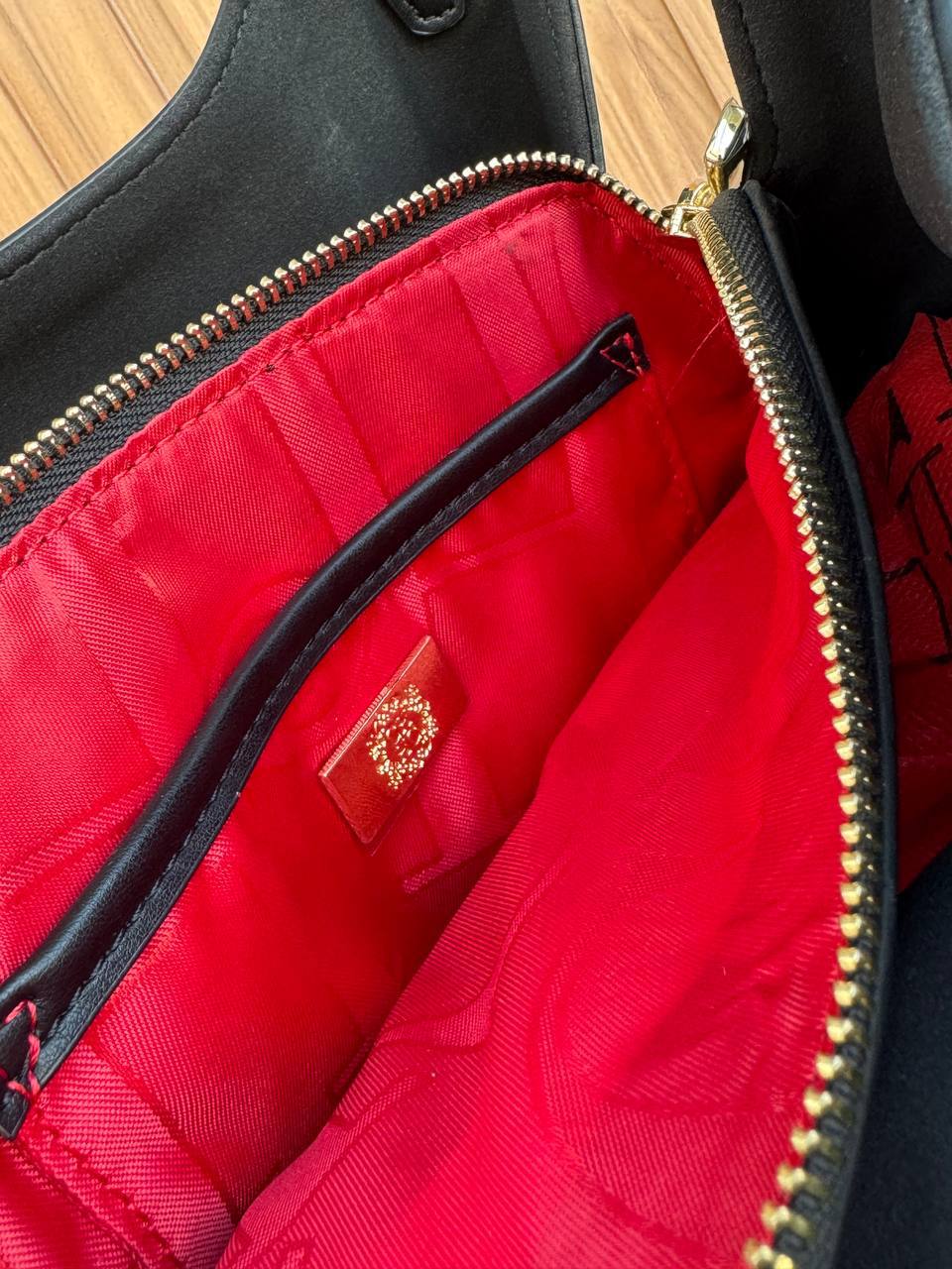 Carolina Herrera Monogram Embossed Leather Hobo Bag