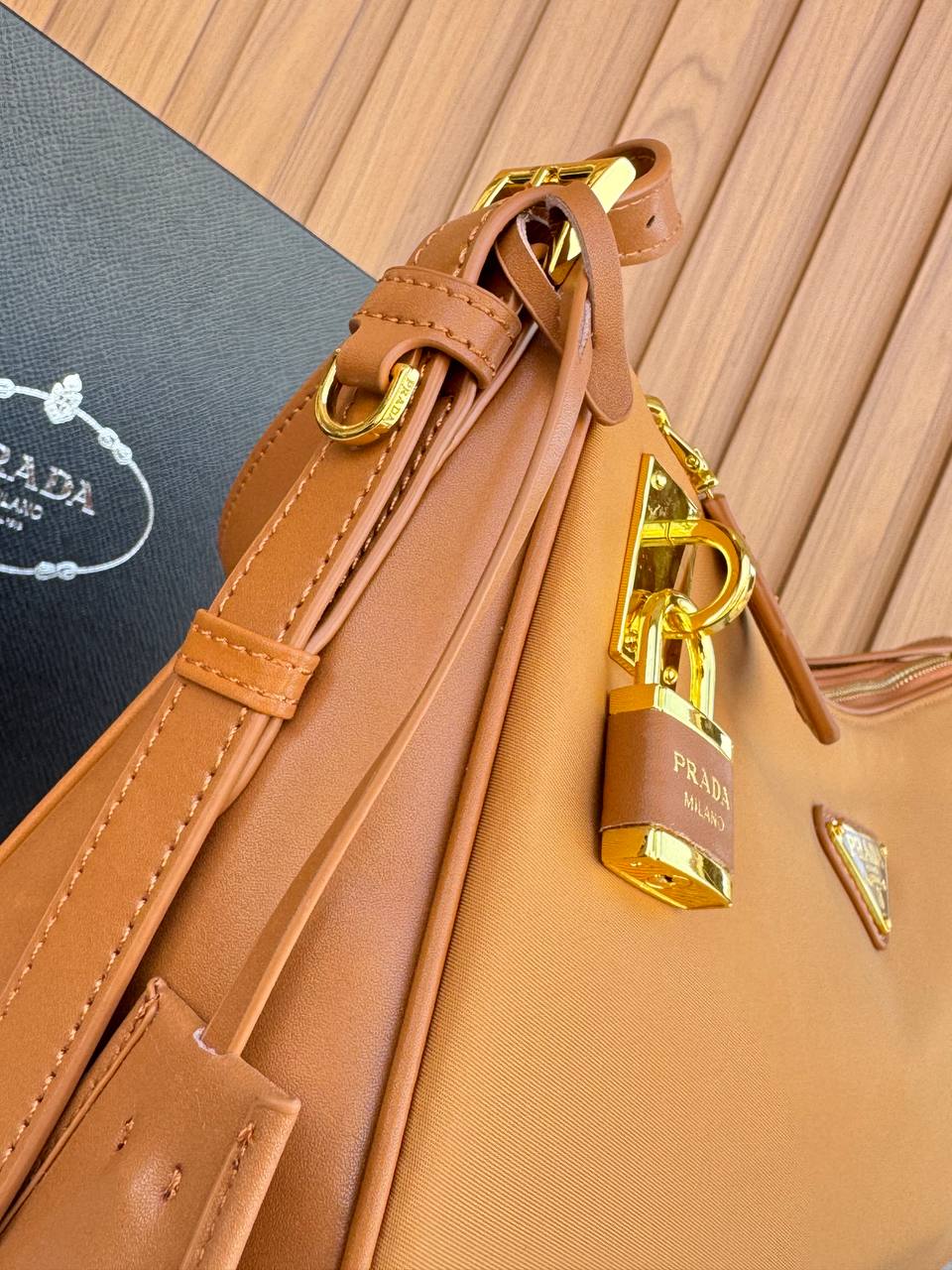 Prada Re-Edition Hobo Bag with Padlock