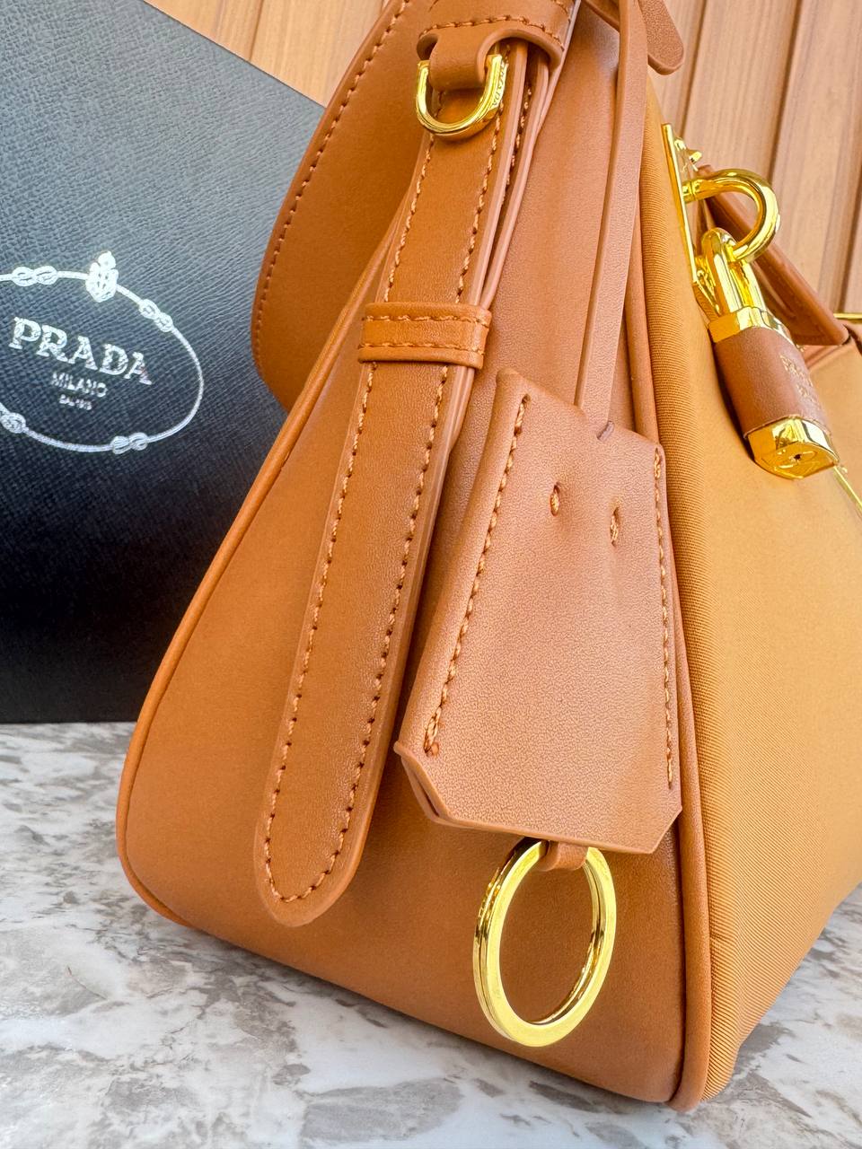 Prada Re-Edition Hobo Bag with Padlock