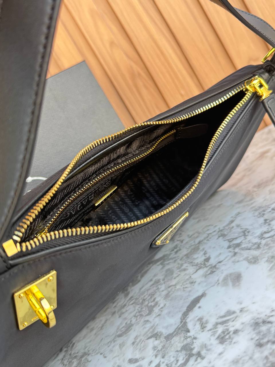 Prada Re-Edition Hobo Bag with Padlock