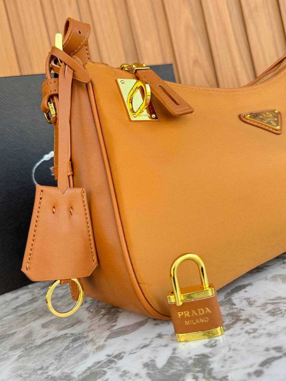 Prada Re-Edition Hobo Bag with Padlock