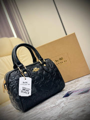 Coach Mini Rowan Crossbody bag in signature leather