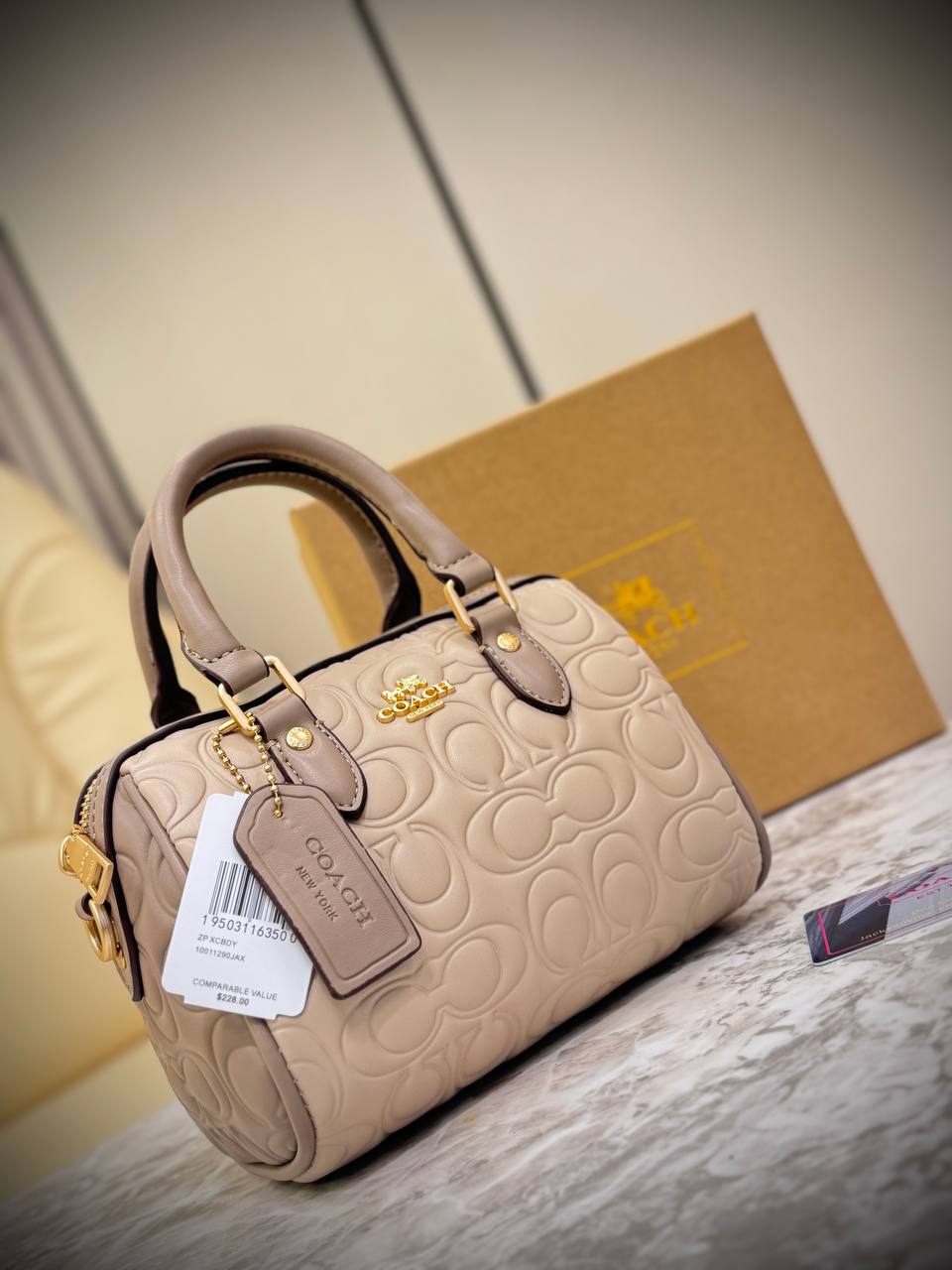 Coach Mini Rowan Crossbody bag in signature leather