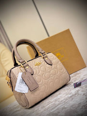 Coach Mini Rowan Crossbody bag in signature leather