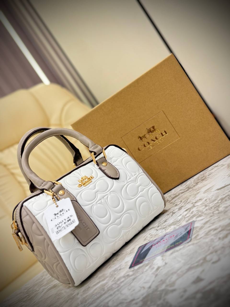 Coach Mini Rowan Crossbody bag in signature leather