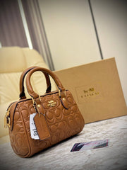 Coach Mini Rowan Crossbody bag in signature leather