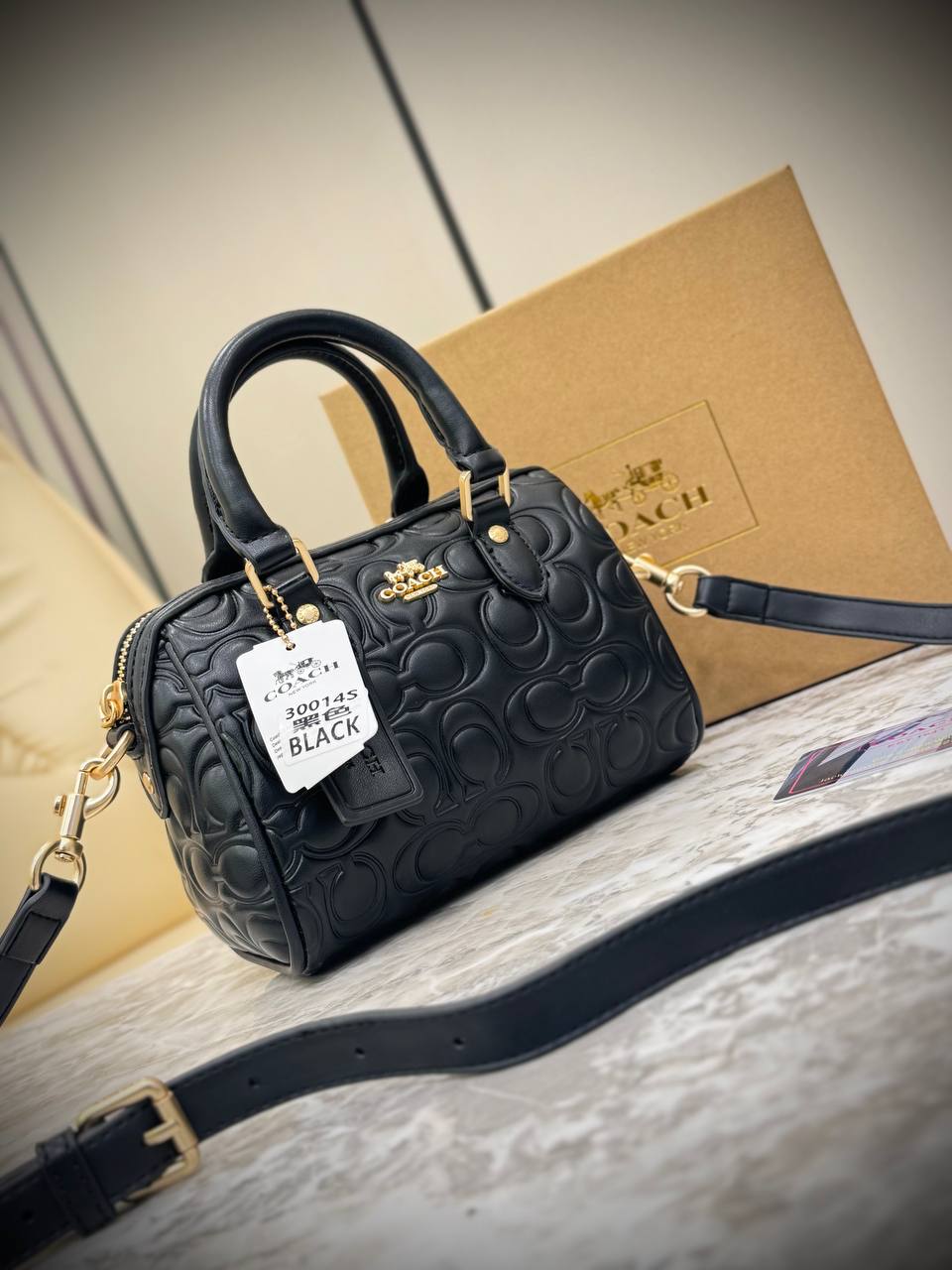 Coach Mini Rowan Crossbody bag in signature leather