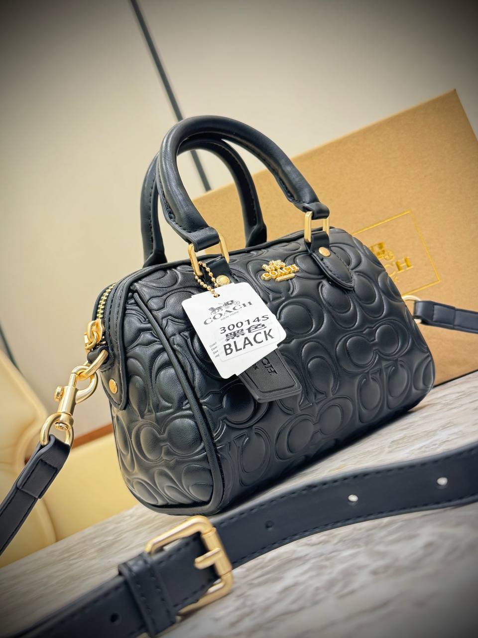 Coach Mini Rowan Crossbody bag in signature leather