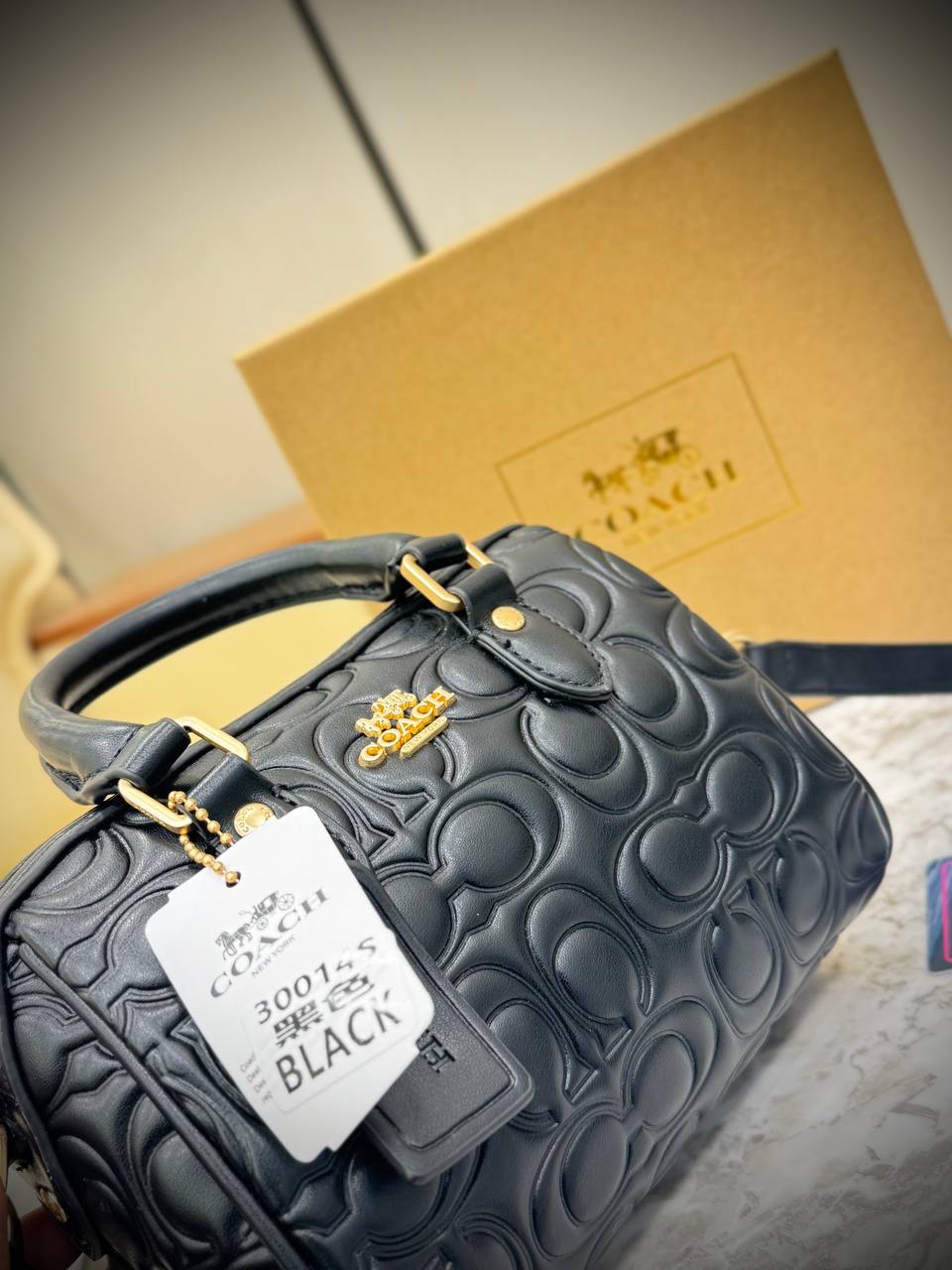 Coach Mini Rowan Crossbody bag in signature leather