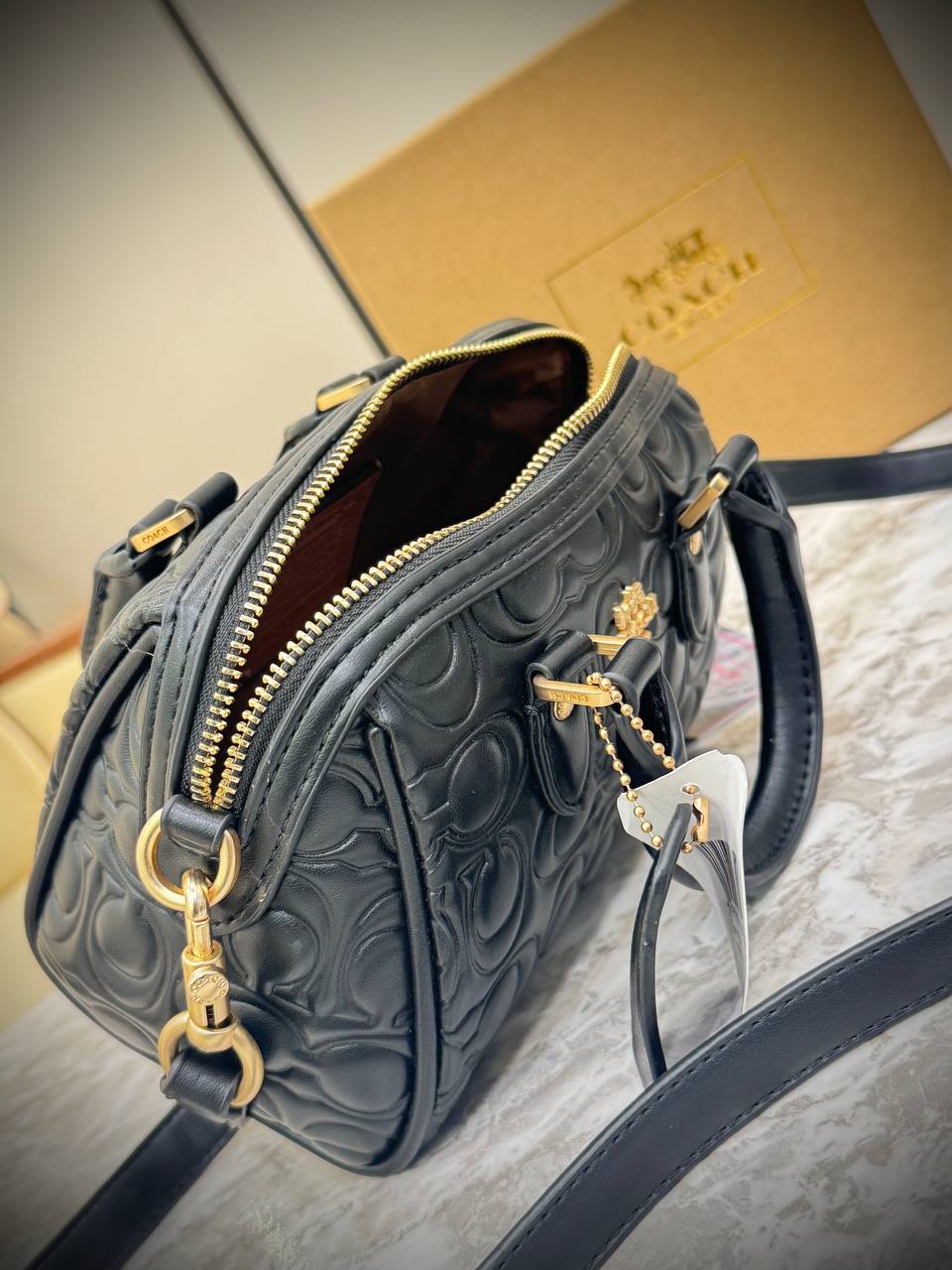Coach Mini Rowan Crossbody bag in signature leather