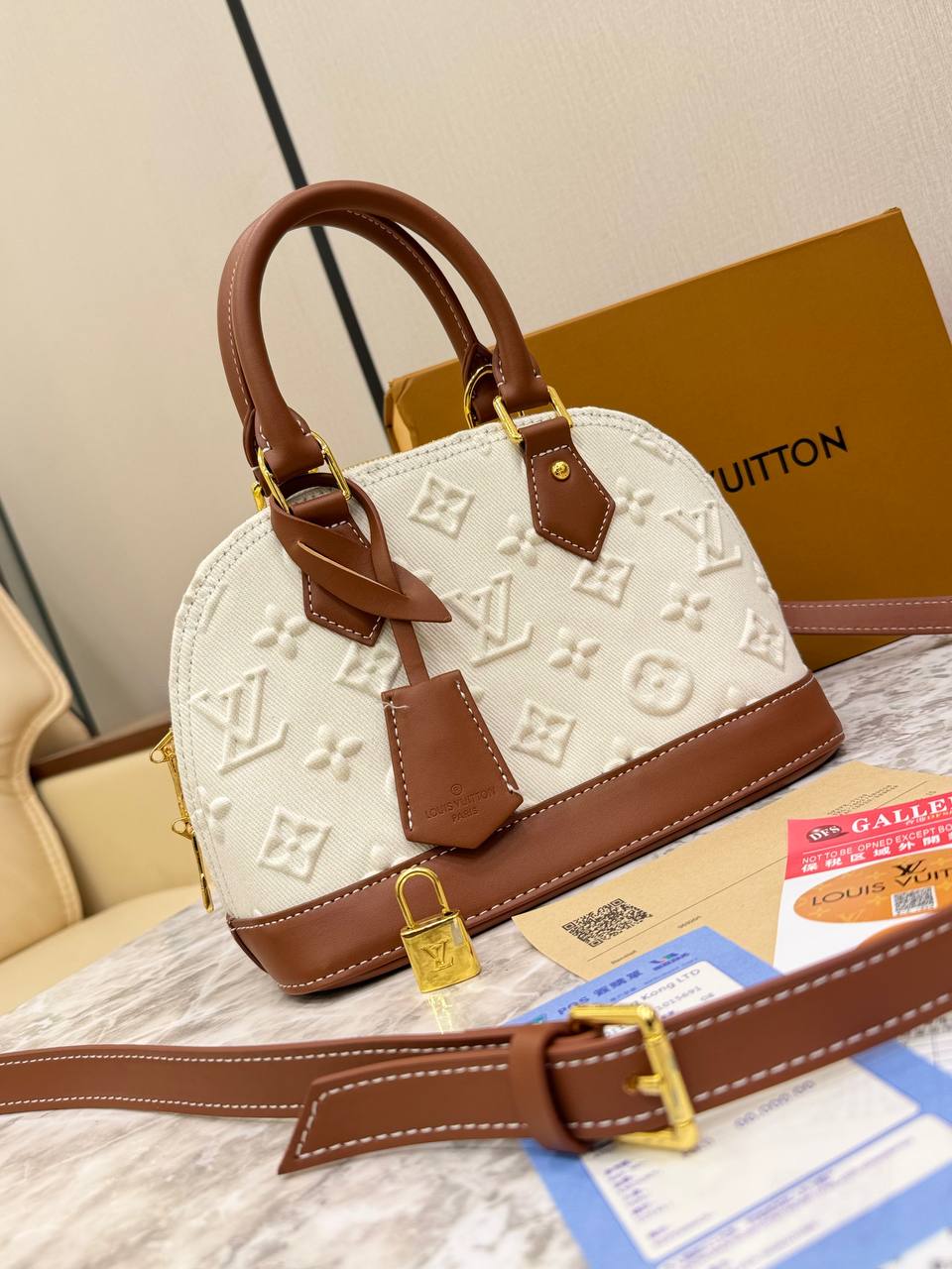 Louis Vuitton Alma BB in Embossed Monogram Denim