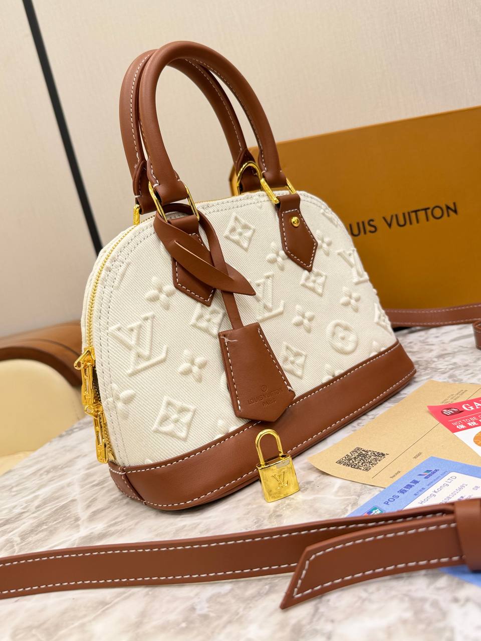 Louis Vuitton Alma BB in Embossed Monogram Denim