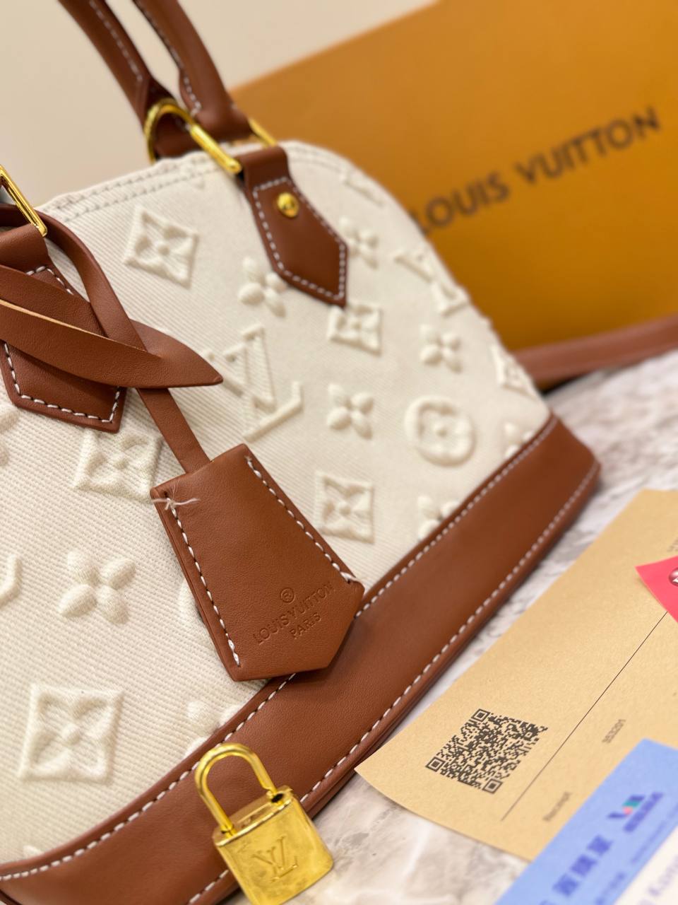 Louis Vuitton Alma BB in Embossed Monogram Denim