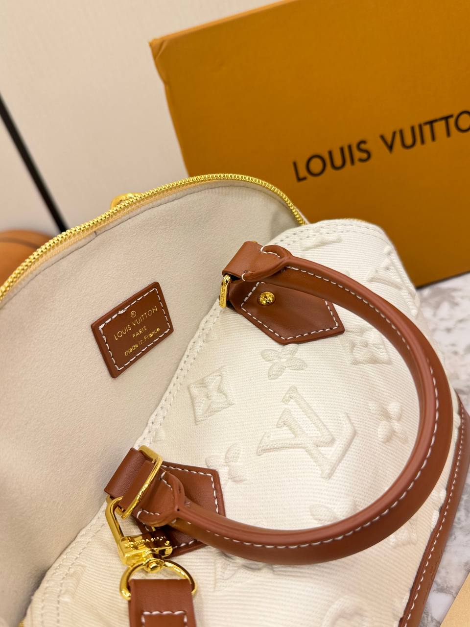 Louis Vuitton Alma BB in Embossed Monogram Denim